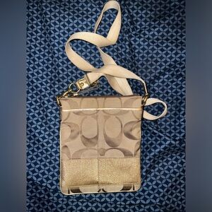 Coach cross body purse.